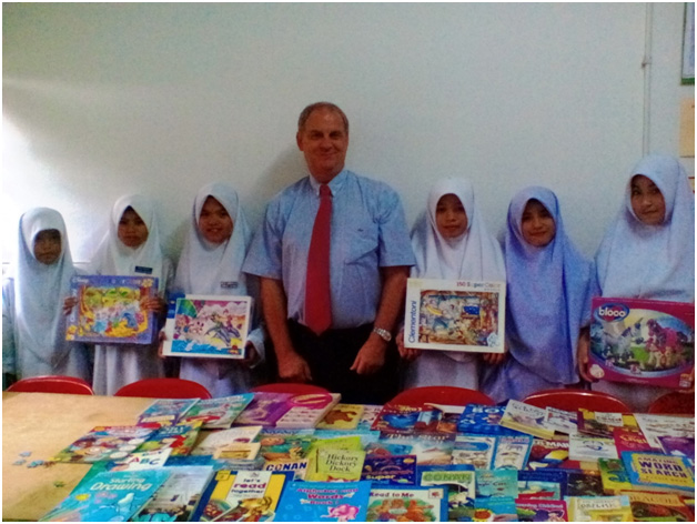Mr. Alan Dighton, donated some books for the school library.